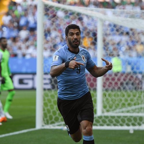 Highlights: Suarez sinks Saudi to send Uruguay through