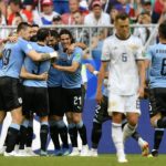 Smolnikov sees red as Uruguay thrash Russia
