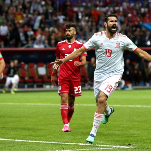 Costa helps Spain squeeze past Iran