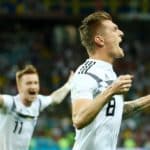 Toni Kroos celebrates his goal against Sweden