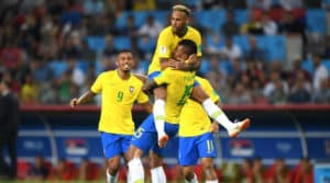 Read more about the article Paulinho, Silva help Brazil clinch top spot