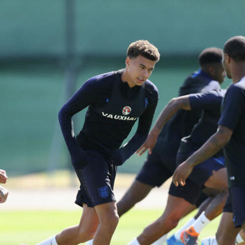 Alli back in England training