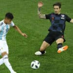 Maximiliano Meza of Argentina passes the ball past Sime Vrsaljko of Croatia