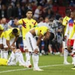 Players of Colombia react after the penalty shootout loss to England.