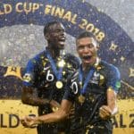 Paul Pogba and Kylian Mbappe of France celebrate winning the World Cup.