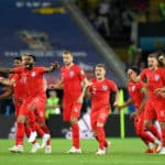 England players celebrating their penalty shoot-out victory over Colombia.
