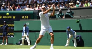 Read more about the article Federer into second round at Wimbledon