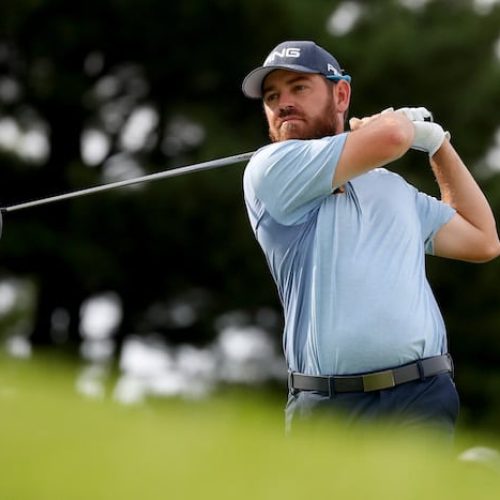 Oosthuizen battles to under par start