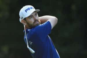 Read more about the article Simpson leads, Oosthuizen and Grace alive