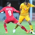 Mario Booysen of Kaizer Chiefs challenged by Eleazar Rodgers of Free State Stars.