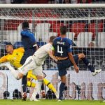 Alphonse Areola of France saves a header from Matthias Ginter of Germany in their Uefa Nations League opener.