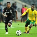 Paseka Mako of Orlando Pirates challenged by Siboniso Conco of Golden Arrows