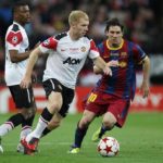 Lionel Messi and Paul Scholes