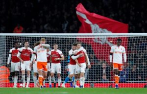 Read more about the article Arsenal edge Blackpool in feisty affair