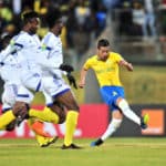 Gaston Sirino challenged by Ablamvi Djadja