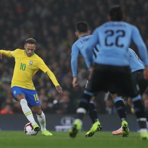 Neymar guides Brazil past Uruguay