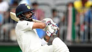 Read more about the article Kohli guides India through second day
