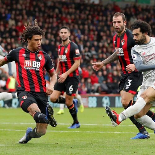 Hat-trick hero Salah sends Reds top