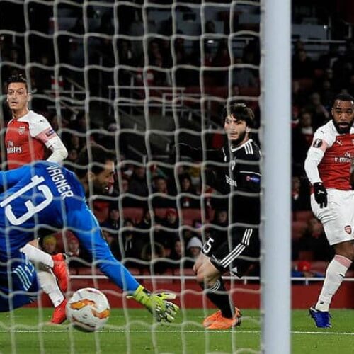 Lacazette on target as Saka shines