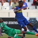 Surprise Ralani of Cape Town City FC tackled by Lucky Baloyi of Bloemfontein Celtic