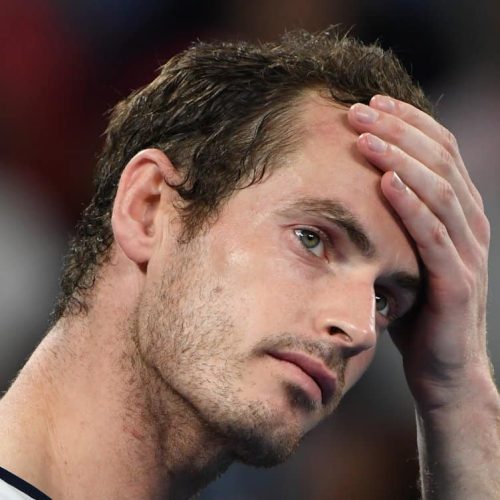 Federer advances, heartbreak for Murray