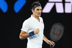 Read more about the article Federer, Nadal through, Wozniacki out