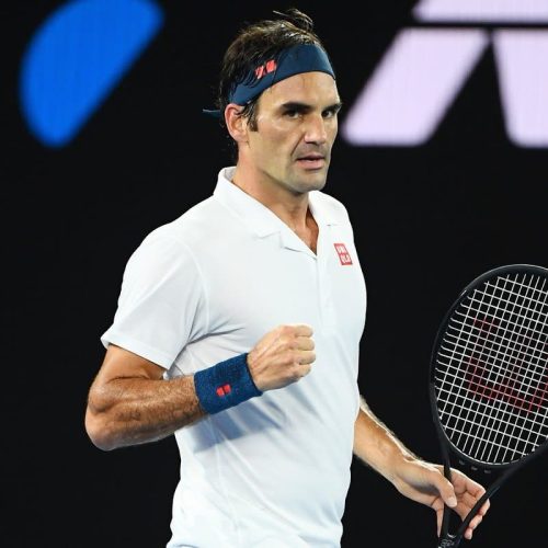 Federer, Nadal through, Wozniacki out