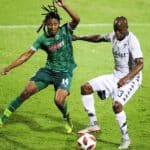 Siyethemba Sithebe of AmaZulu FC and Sifiso Hlanti of Bidvest Wits