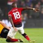 Ashley Young of Manchester United sent off for his challenge on Diogo Jota of Wolves