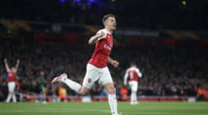 Read more about the article Ramsey helps guide Arsenal past Napoli