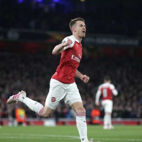 Ramsey helps guide Arsenal past Napoli
