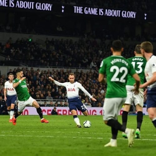 Late Eriksen strike fires Spurs past Brighton