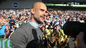 Read more about the article Guardiola adamant winning Premier League harder than Champions League