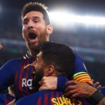 Lionel Messi celebrates with his Barcelona teammates