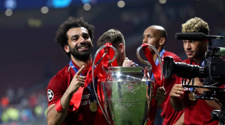 Liverpool's Mohamed Salah celebrates with the trophy after the UEFA Champions League Final at the Wanda Metropolitano, Madrid.