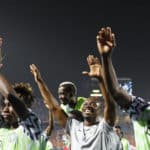 Nigerian players celebrate after to progressing to the Afcon semis