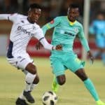 Thabang Monare of Bidvest Wits challenged by Tshediso Patjie of Baroka FC
