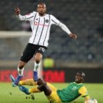 Xola Mlambo of Orlando Pirates tackled by Michael Gumede of Golden Arrows