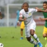 Lyle Lakay of Mamelodi Sundowns challenged by Seth Parusnath of Golden Arrows