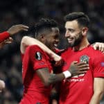 Manchester United's Bruno Fernandes celebrates scoring his sides first goal with teammates during the Europa League match at Old Trafford, Manchester.