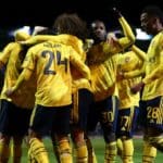 Arsenal battle into FA Cup quarter-finals