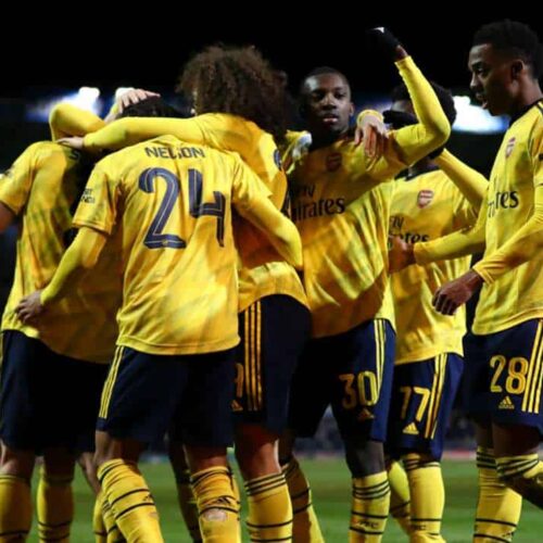 Arsenal battle into FA Cup quarter-finals