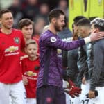 Manchester United goalkeeper David de Gea greets Manchester City's Sergio Aguero during the Premier League match at Old Trafford, Manchester.