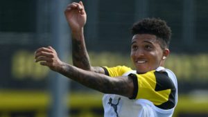 Read more about the article Sancho insists he’s happy at Dortmund as Man United interest continues