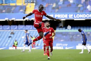 Read more about the article Mane double fires Liverpool past 10-man Chelsea