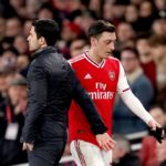 Arsenal coach Mikel Arteta and Mesut Ozil