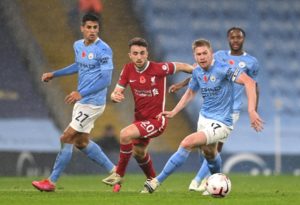 Read more about the article Man City, Liverpool share spoils after De Bruyne penalty miss