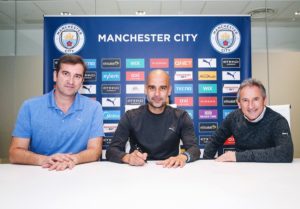 Read more about the article Pep Guardiola signs new two-year contract with Manchester City