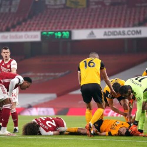 Jimenez head injury overshadows Wolves win at Arsenal