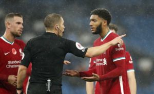Read more about the article Liverpool pair voice frustrations with handball law, VAR after Etihad draw